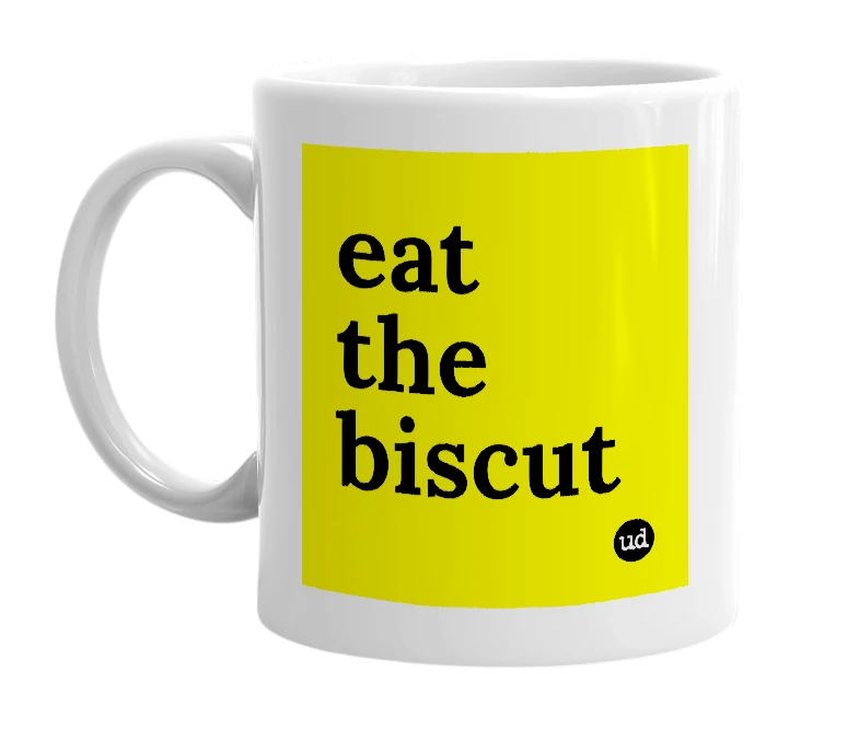 White mug with 'eat the biscut' in bold black letters