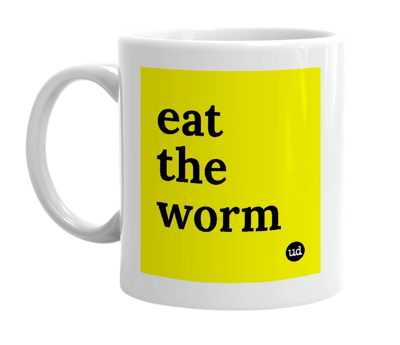 White mug with 'eat the worm' in bold black letters