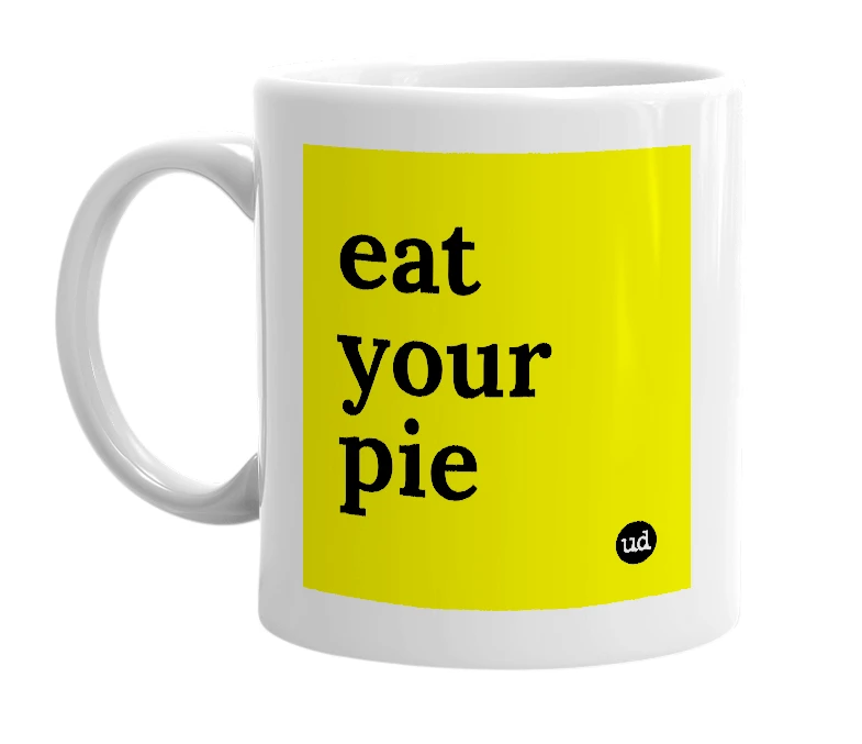 White mug with 'eat your pie' in bold black letters
