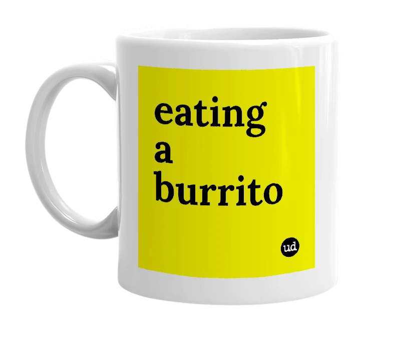 White mug with 'eating a burrito' in bold black letters