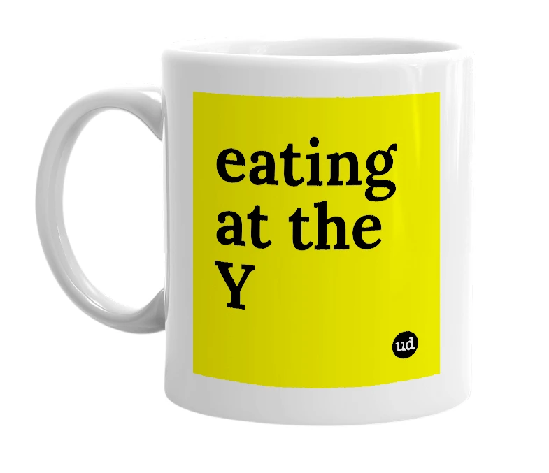 White mug with 'eating at the Y' in bold black letters