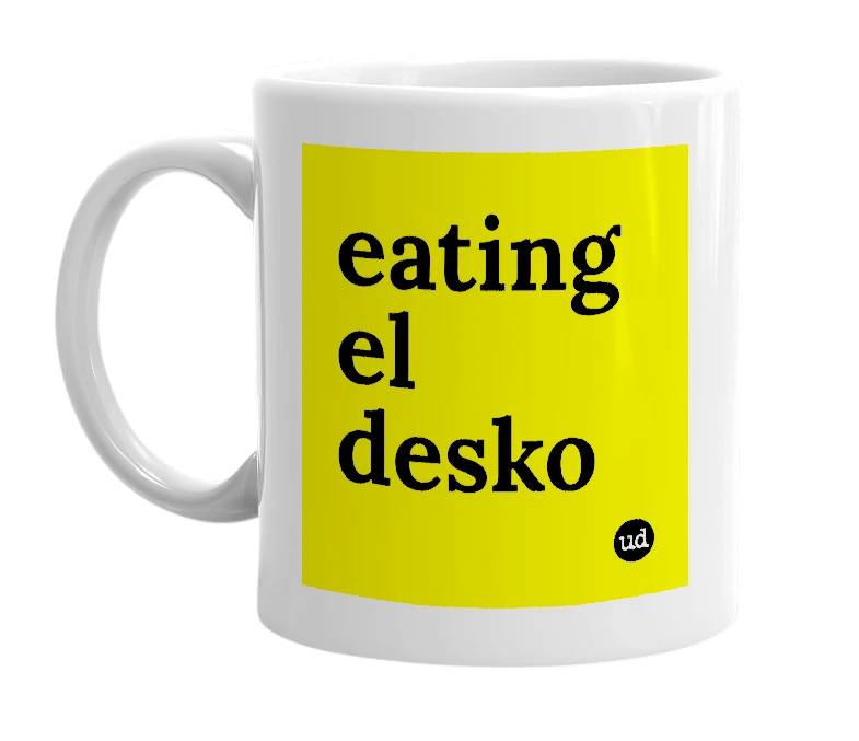White mug with 'eating el desko' in bold black letters