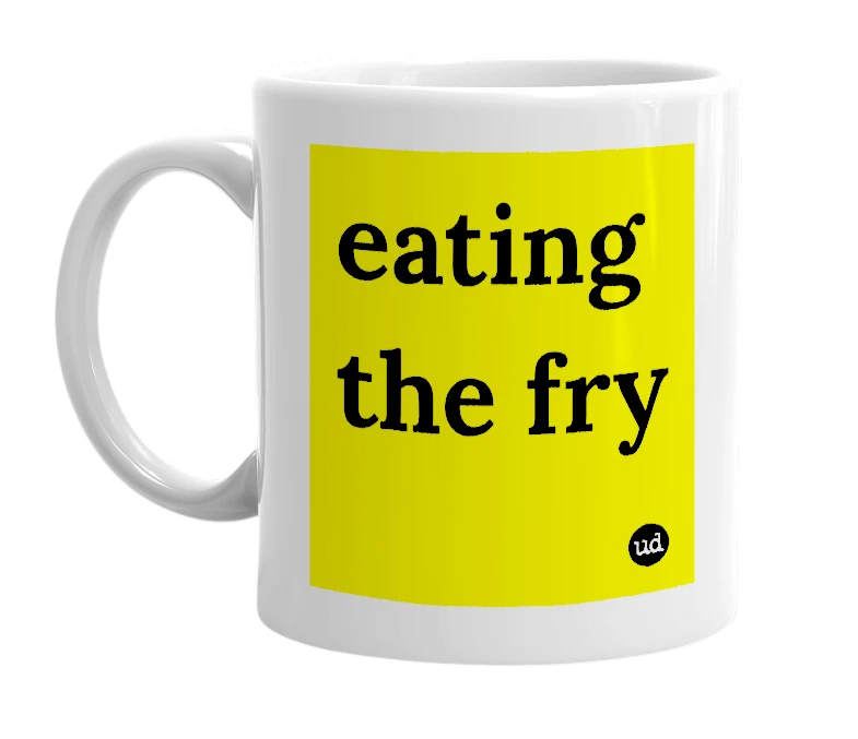 White mug with 'eating the fry' in bold black letters