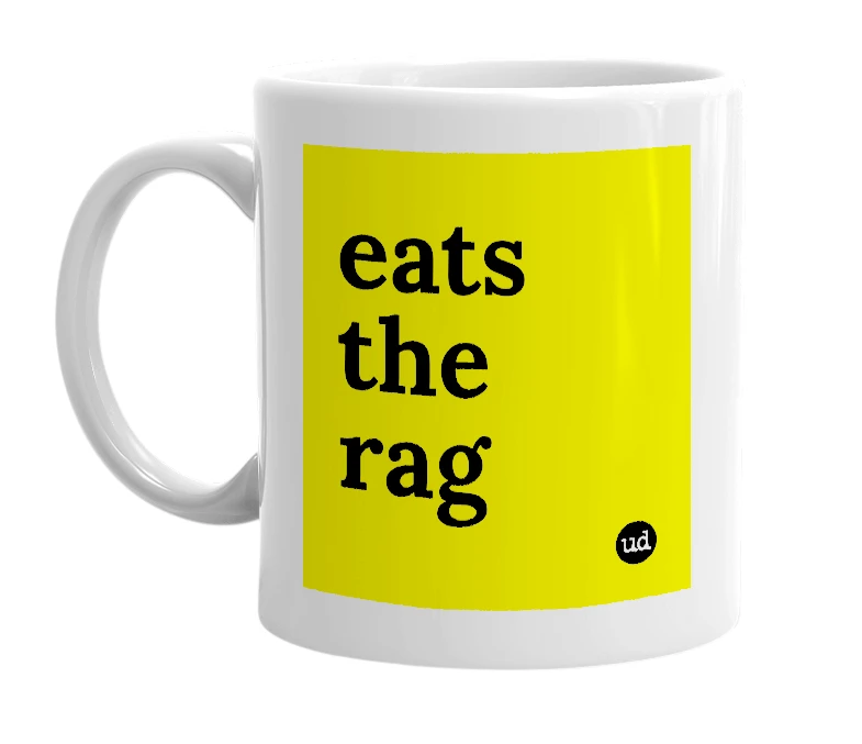 White mug with 'eats the rag' in bold black letters