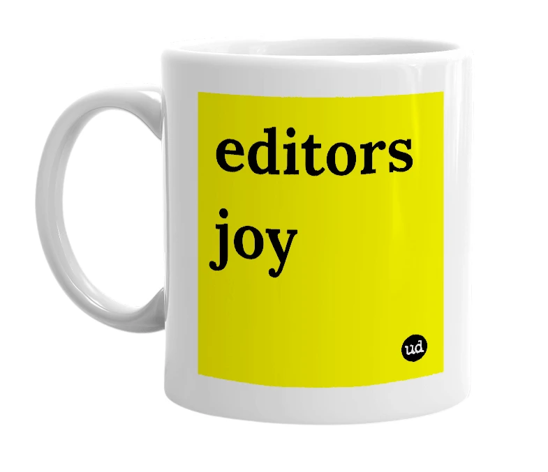 White mug with 'editors joy' in bold black letters
