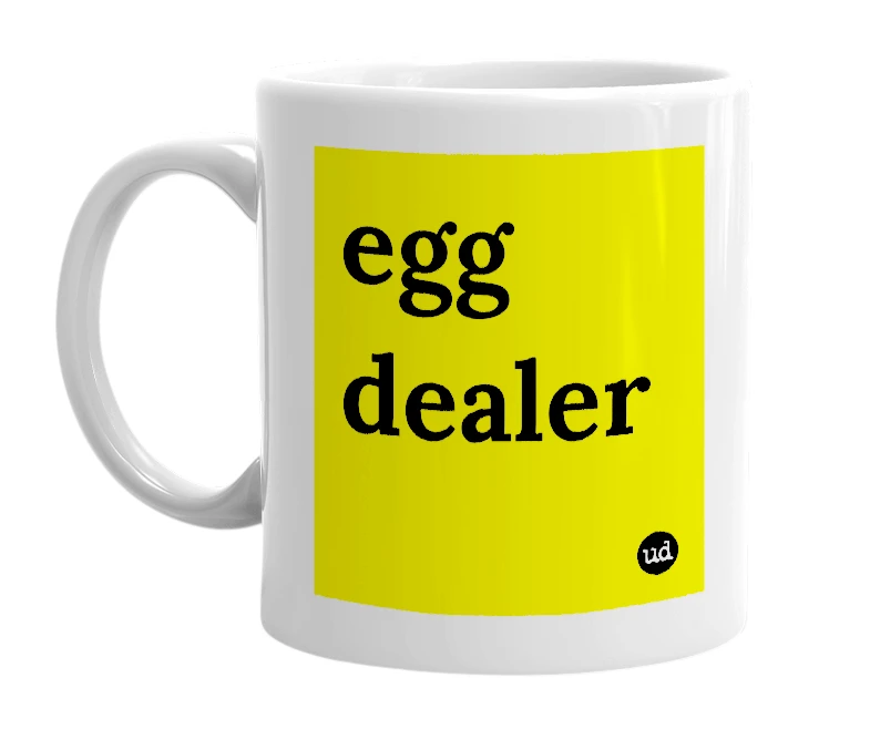 White mug with 'egg dealer' in bold black letters