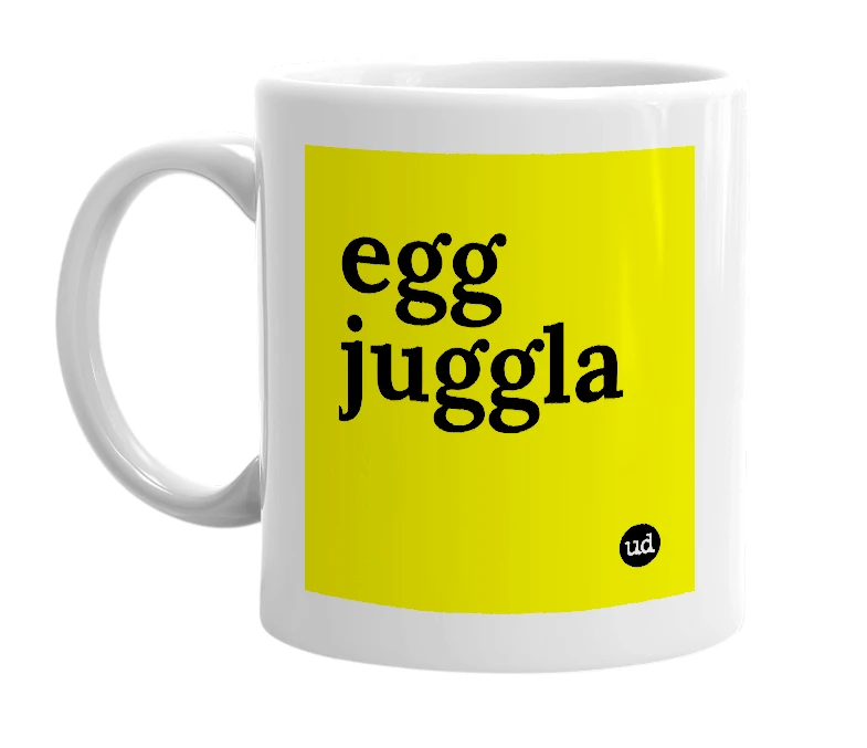 White mug with 'egg juggla' in bold black letters