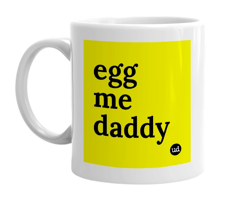 White mug with 'egg me daddy' in bold black letters