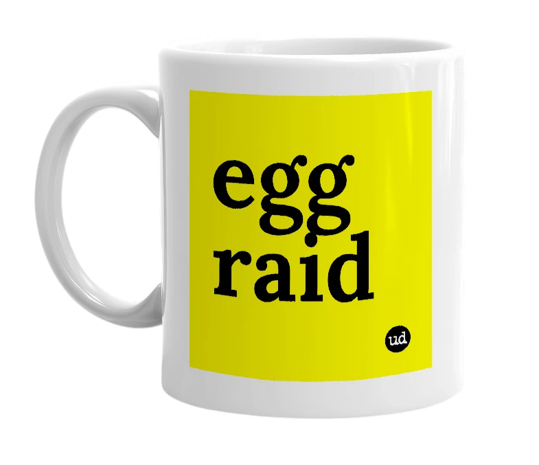 White mug with 'egg raid' in bold black letters