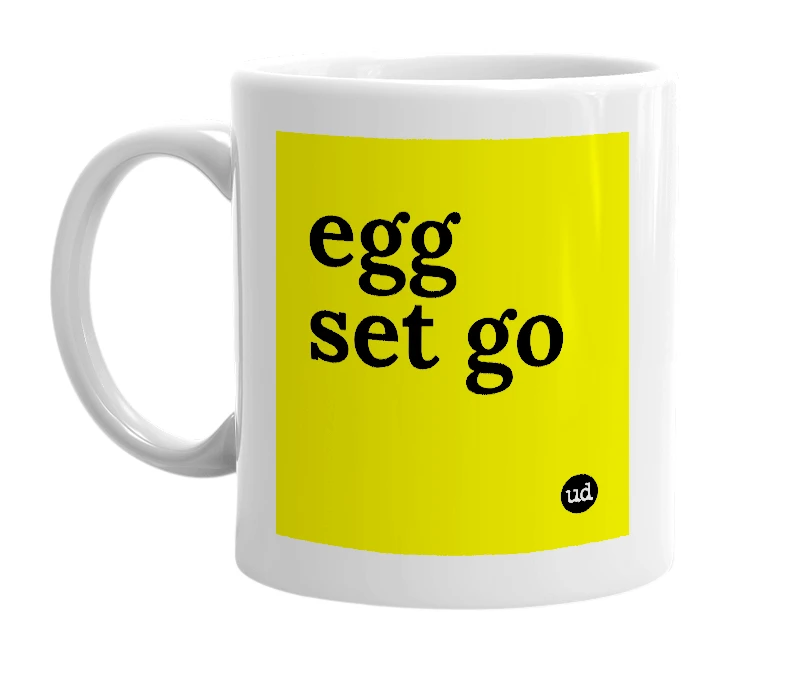 White mug with 'egg set go' in bold black letters
