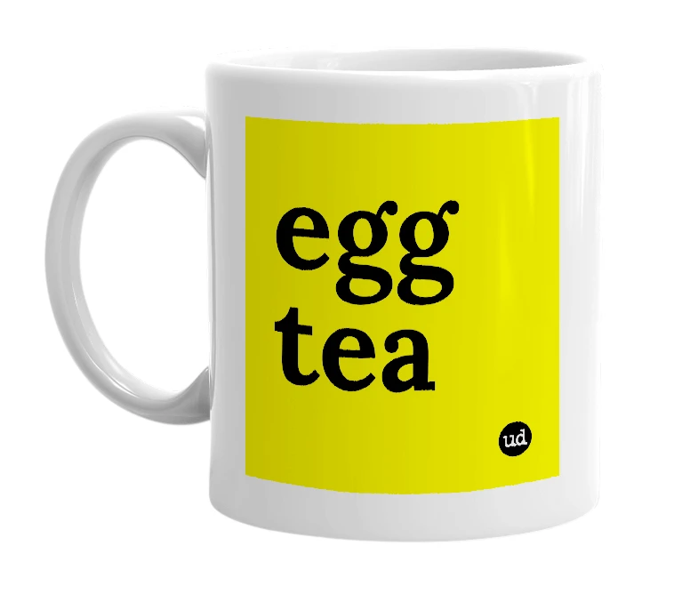 White mug with 'egg tea' in bold black letters