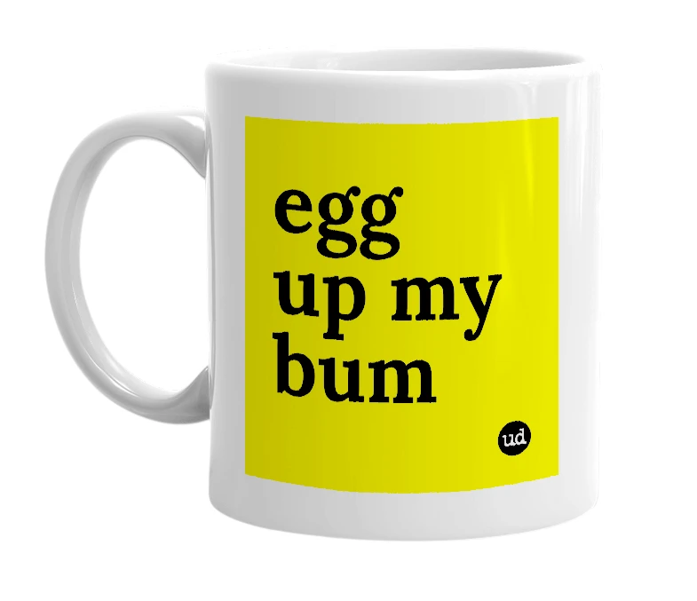 White mug with 'egg up my bum' in bold black letters