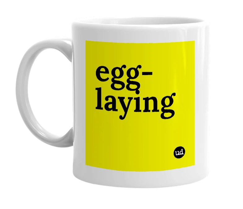 White mug with 'egg-laying' in bold black letters