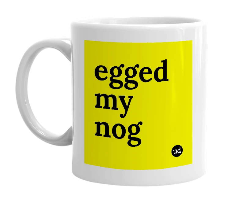 White mug with 'egged my nog' in bold black letters