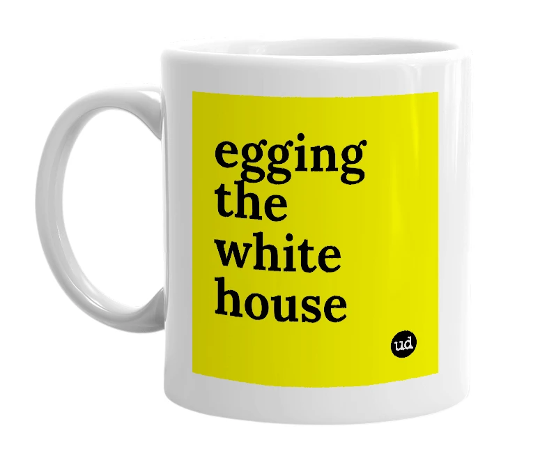 White mug with 'egging the white house' in bold black letters