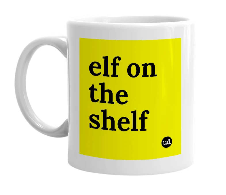 White mug with 'elf on the shelf' in bold black letters