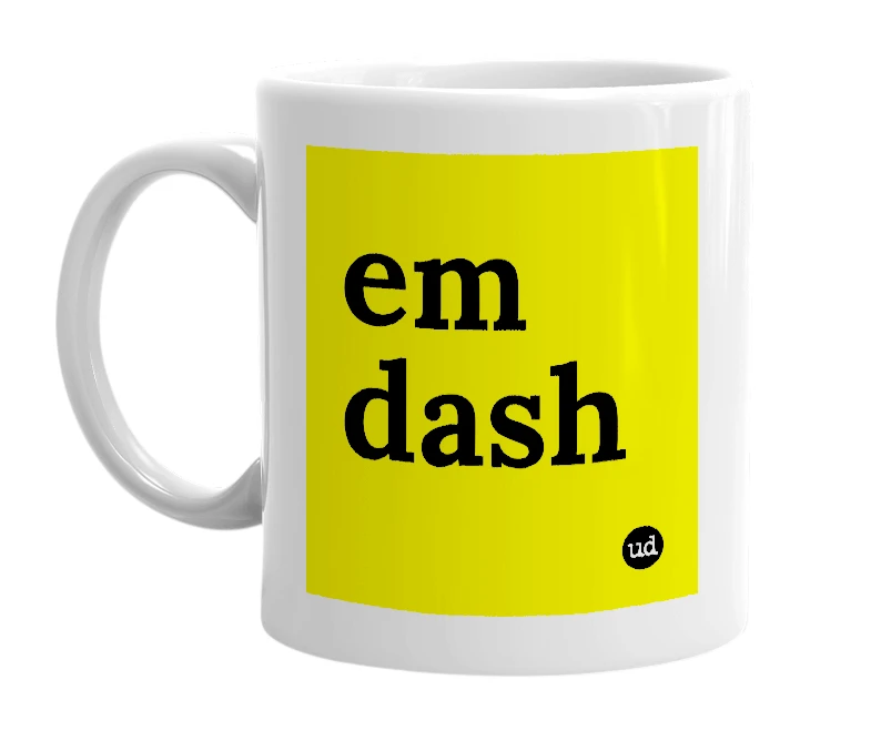 White mug with 'em dash' in bold black letters