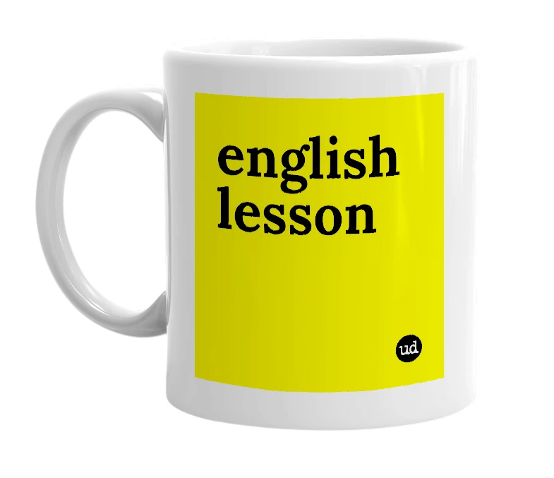 White mug with 'english lesson' in bold black letters