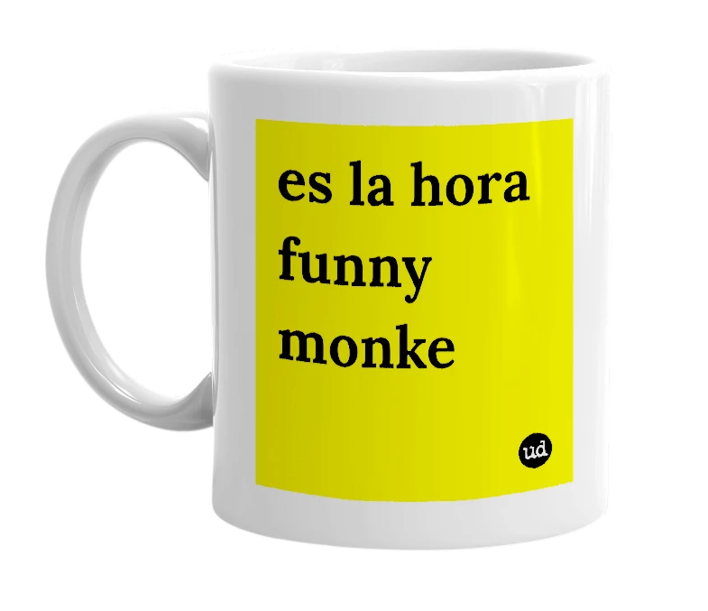 White mug with 'es la hora funny monke' in bold black letters