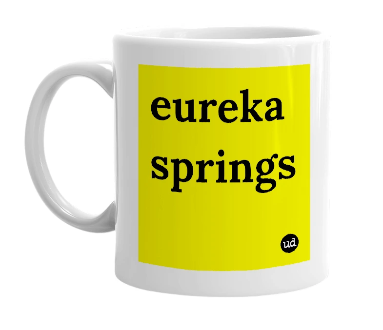 White mug with 'eureka springs' in bold black letters