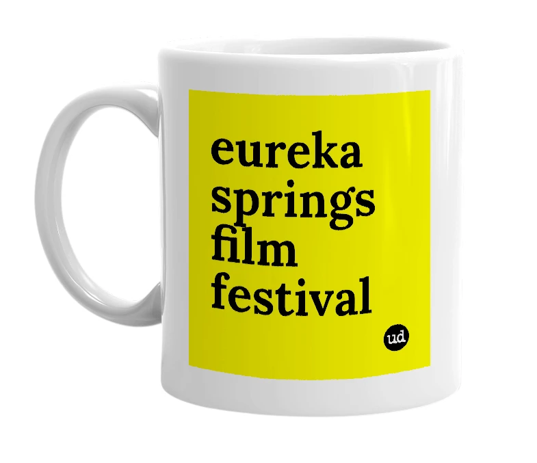 White mug with 'eureka springs film festival' in bold black letters