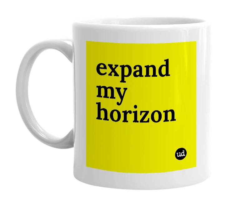 White mug with 'expand my horizon' in bold black letters