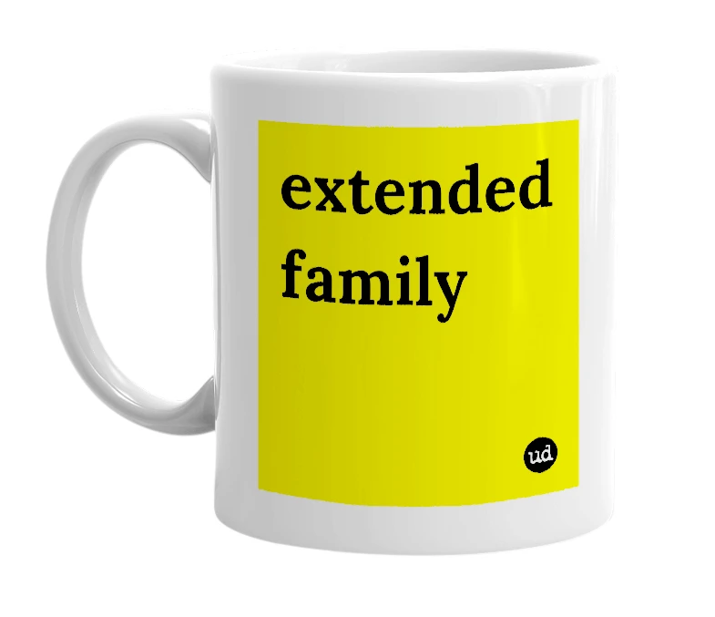 White mug with 'extended family' in bold black letters