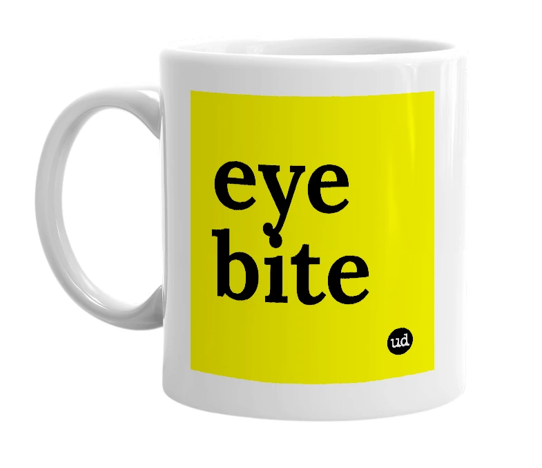 White mug with 'eye bite' in bold black letters