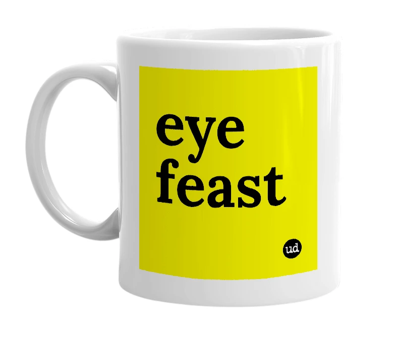 White mug with 'eye feast' in bold black letters