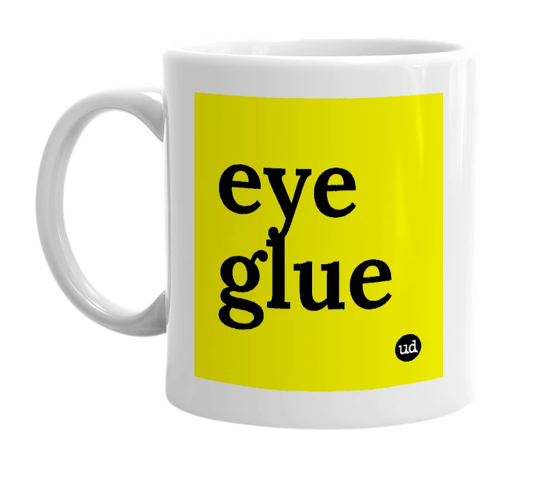 White mug with 'eye glue' in bold black letters