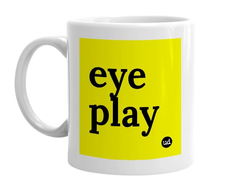 White mug with 'eye play' in bold black letters