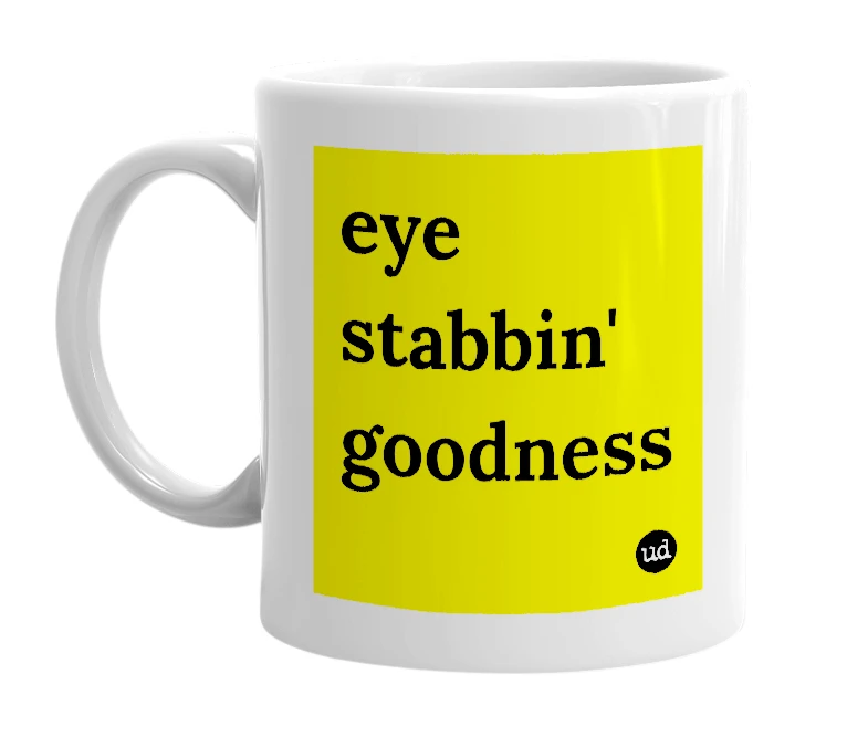 White mug with 'eye stabbin' goodness' in bold black letters