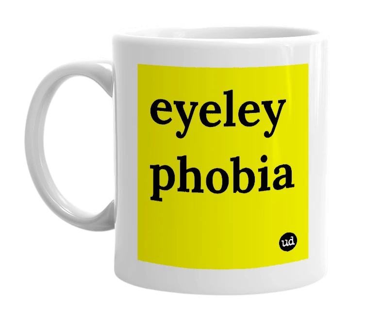 White mug with 'eyeley phobia' in bold black letters