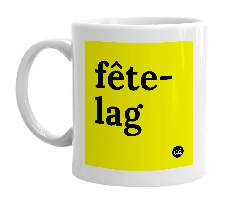 White mug with 'fête-lag' in bold black letters
