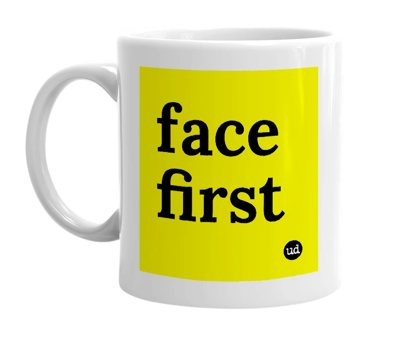 White mug with 'face first' in bold black letters