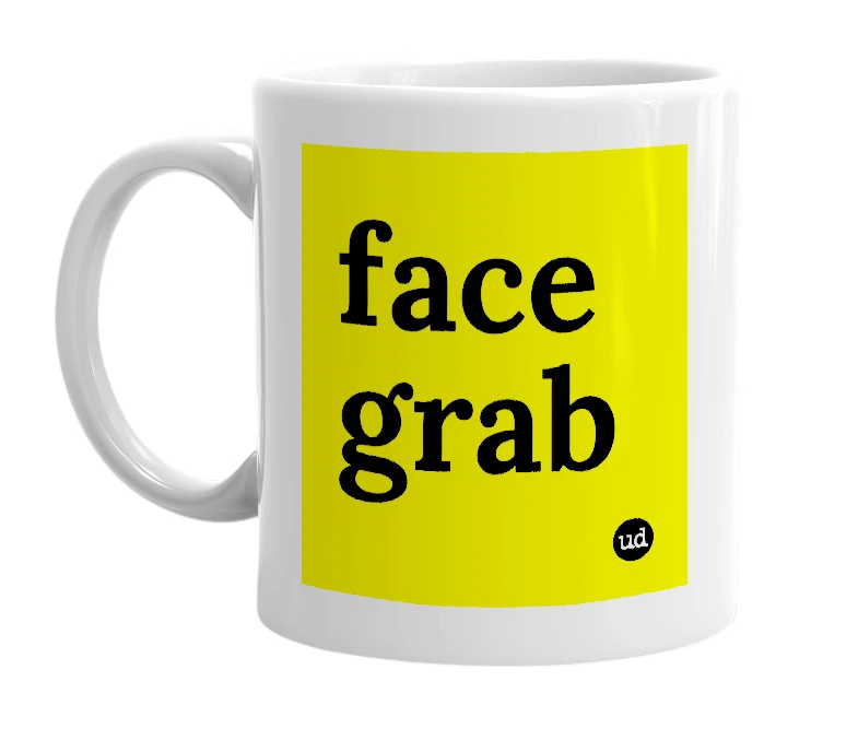 White mug with 'face grab' in bold black letters