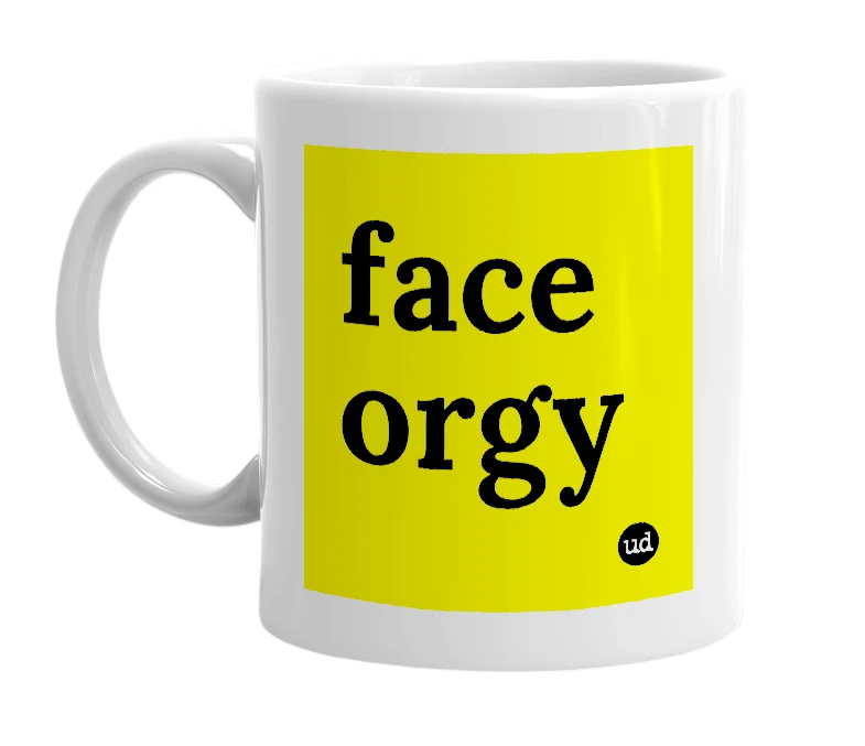 White mug with 'face orgy' in bold black letters