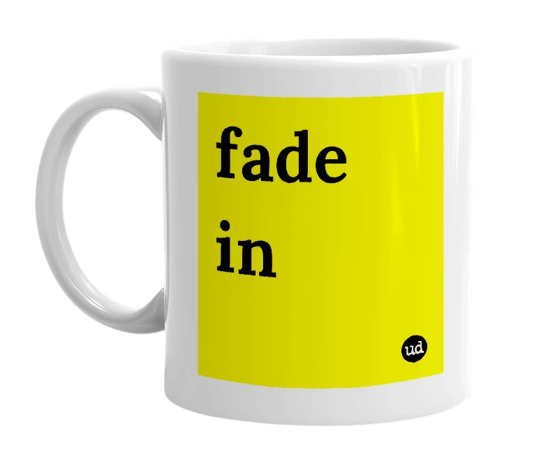 White mug with 'fade in' in bold black letters