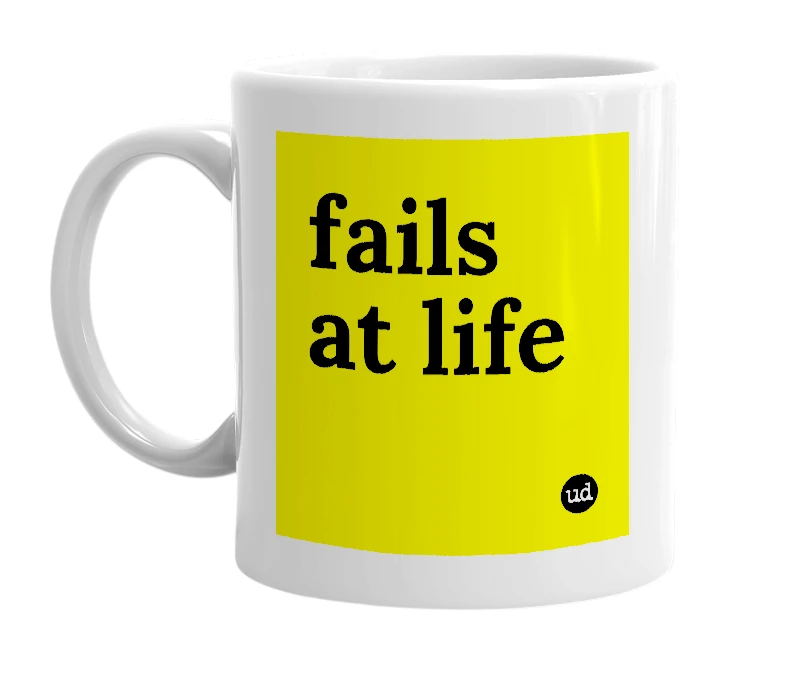 White mug with 'fails at life' in bold black letters