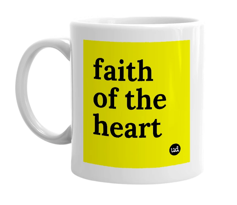 White mug with 'faith of the heart' in bold black letters