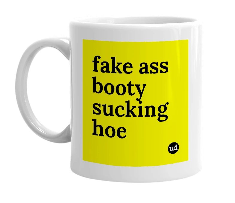 White mug with 'fake ass booty sucking hoe' in bold black letters
