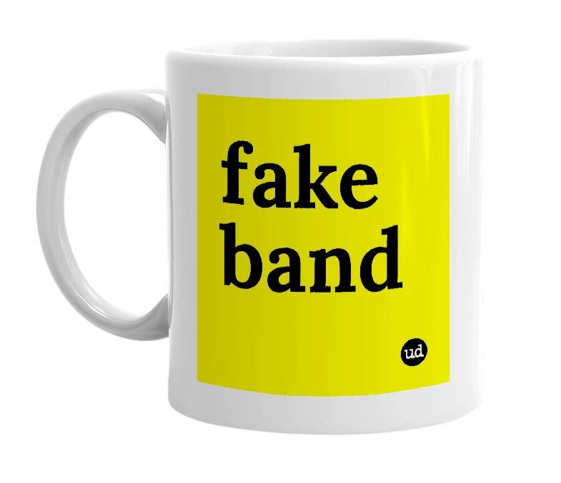 White mug with 'fake band' in bold black letters