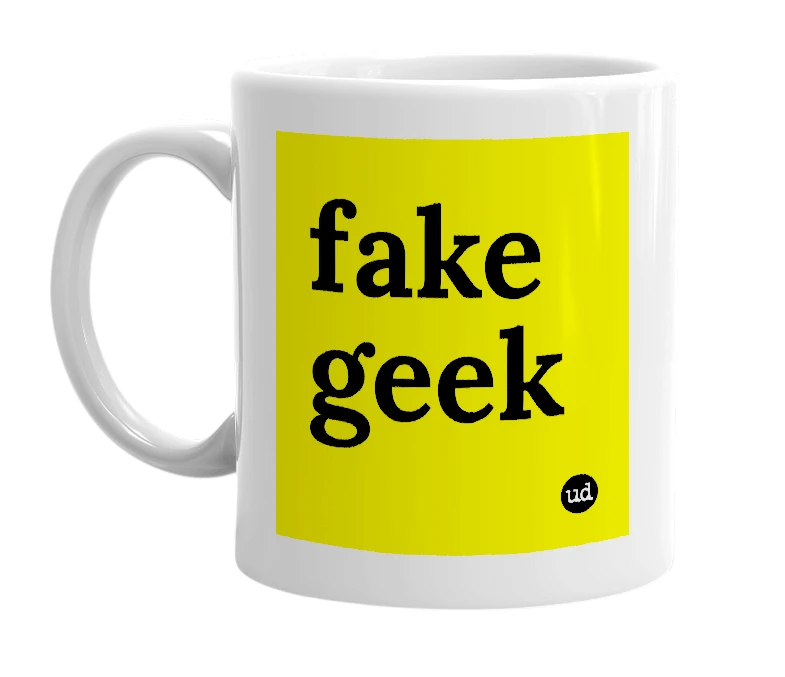 White mug with 'fake geek' in bold black letters