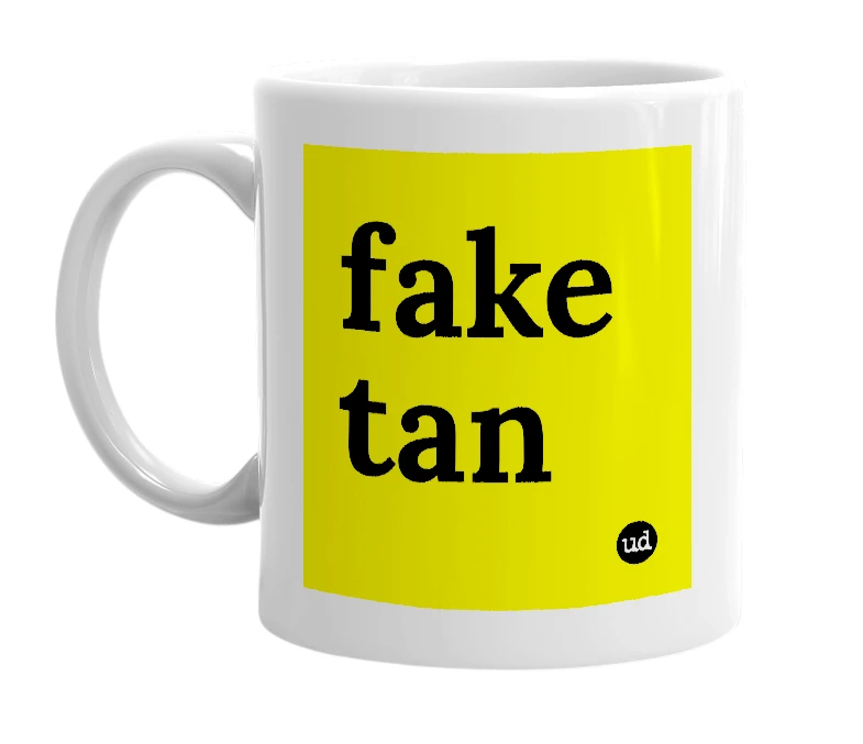 White mug with 'fake tan' in bold black letters