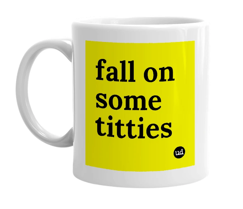 White mug with 'fall on some titties' in bold black letters