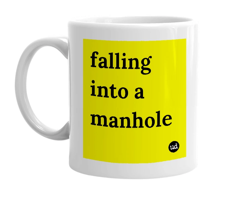 White mug with 'falling into a manhole' in bold black letters