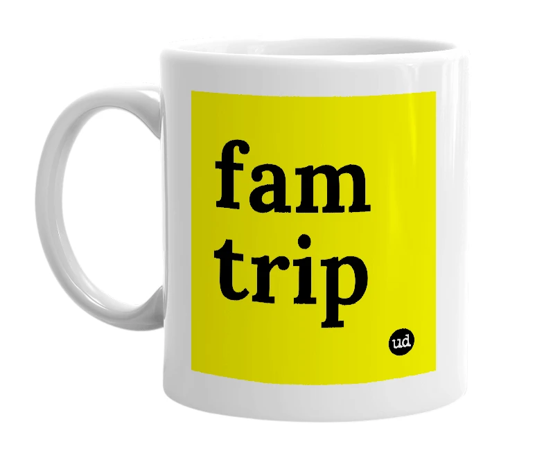 White mug with 'fam trip' in bold black letters