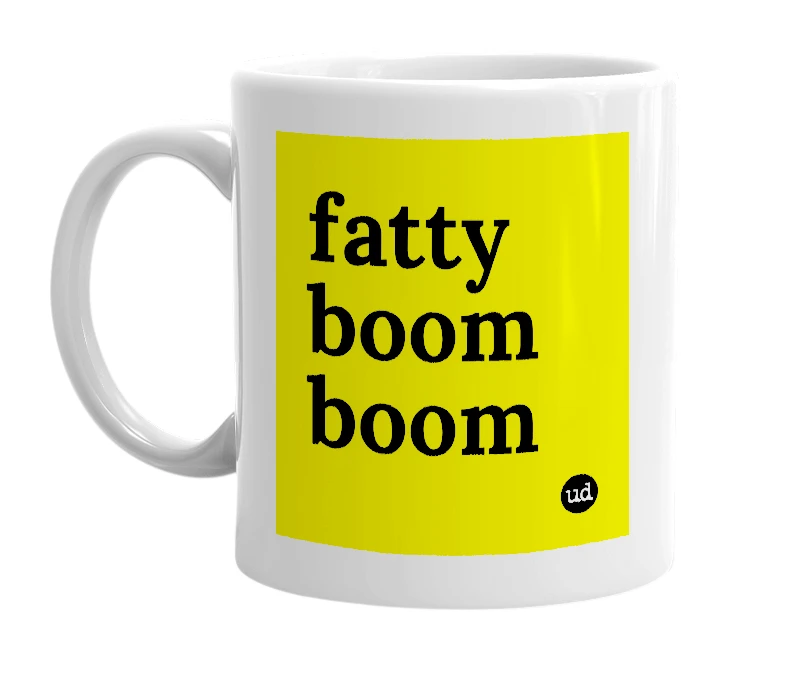 White mug with 'fatty boom boom' in bold black letters