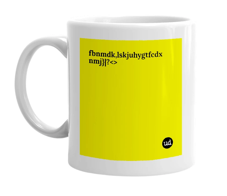 White mug with 'fbnmdk,lskjuhygtfcdx nmj}|?<>' in bold black letters