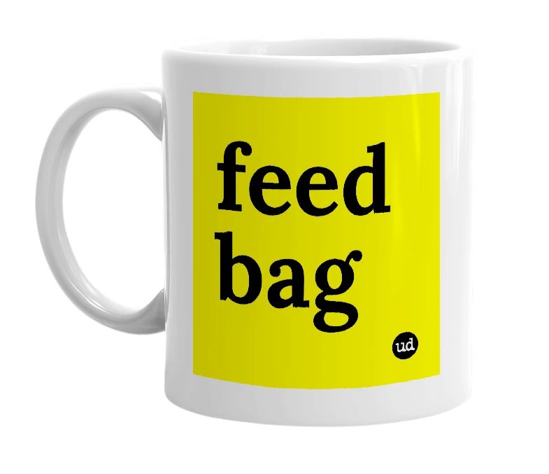 White mug with 'feed bag' in bold black letters